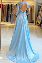 Light blue evening gown with a high slit in a store setting